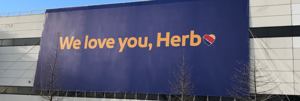 We love you Herb, Southwest airlines banner. Article about Herb Kelleher by Charlie Feld.